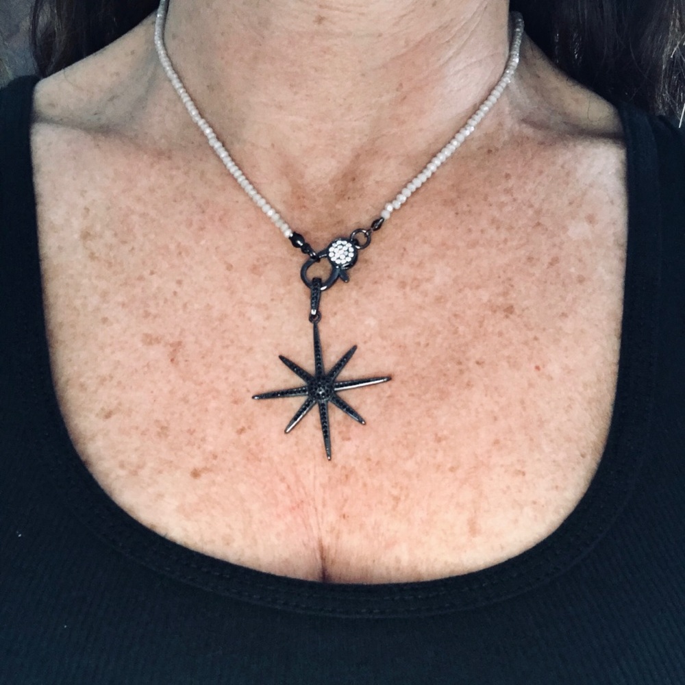 Cream pearlescent necklace with“Star of Hope”